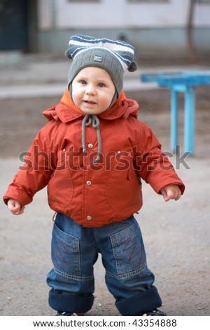 The little boy on walk in the spring