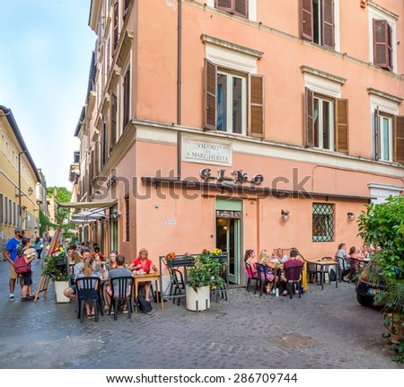ROME, ITALY - MAY O5, 2015 : Unknown people out side the  restaurant in Rome, Italy.