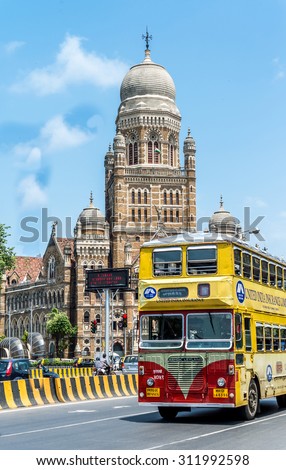 MUMBAI, INDIA - AUGUST 27, 2015 :Two stored bus over  Municipal Corporation building in Mumbai, India.