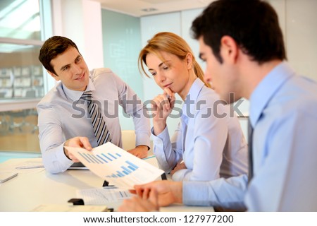 Sales director presenting business plan to team
