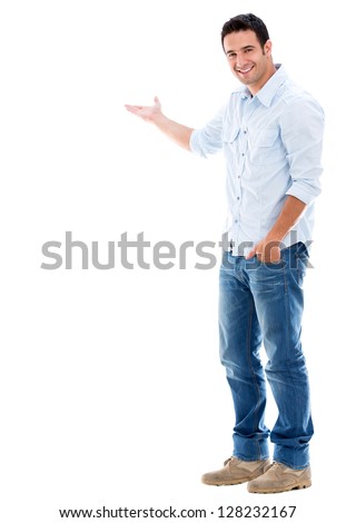 Handsome welcoming man smiling - isolated over a white background