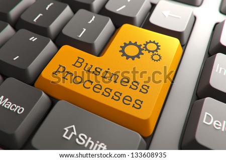 Orange Business Processes Button on Computer Keyboard. Internet Concept.