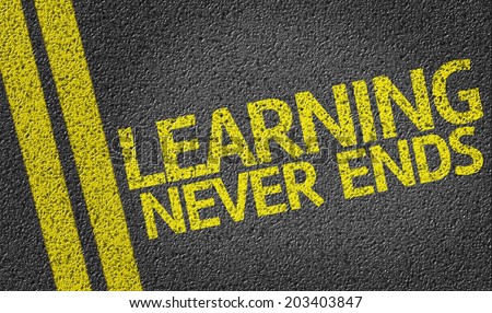 Learning Never Ends written on the road