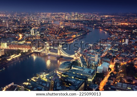 London at night with urban architectures and Tower Bridge