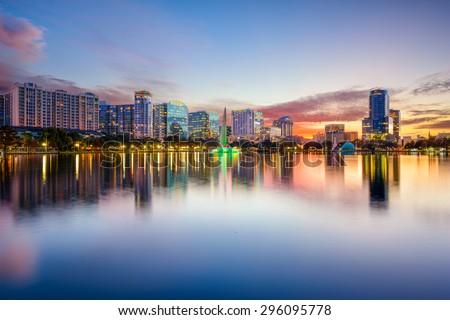 Orlando, Florida, USA downtown city skyline on Eola Lake.