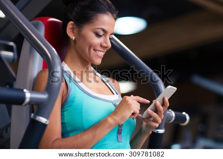 Similar – Image, Stock Photo Fitness Model Using Cell Phone