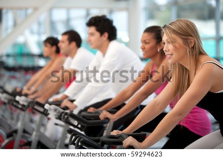 Group of people at the gym and smiling