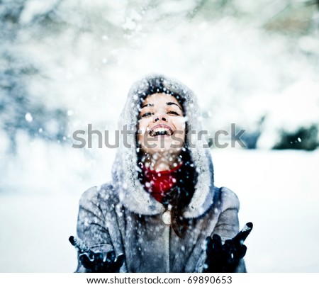 Similar – Image, Stock Photo Woman playing with snow on winter field