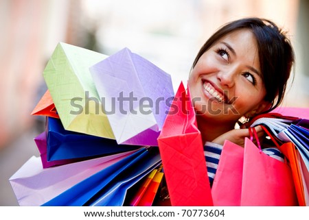 Similar – Image, Stock Photo Smiling Hispanic shopper with gift bags walking on city street