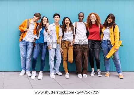 Similar – Image, Stock Photo A happy teenager is texting on a mobile phone, lying on the floor in the living room. Modern technologies, online communication