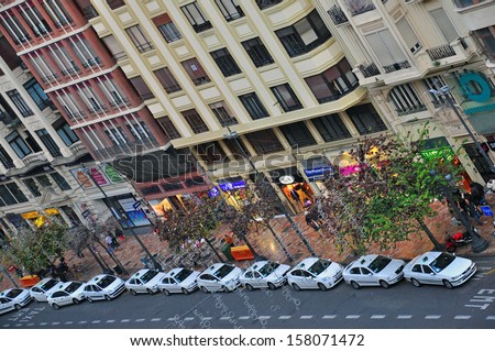VALENCIA, SPAIN - JANUARY 3: Taxi drivers waits for passengers on the main city square on January 3, 2013. Valencia is one of the largest and most famous cities of Spain.