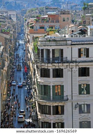 ROME, ITALY - MAY 10, 2011: Cars in traffic on the main street from Spanish Square in Rome on May 10, 2011. Rome is the capital and the largest city of Italy.