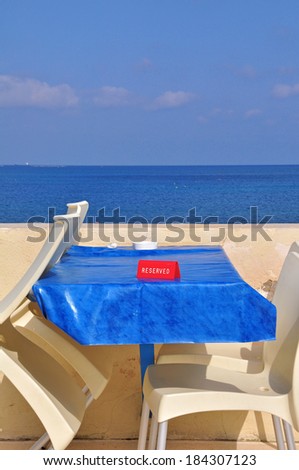 Cafe table by the sea with \