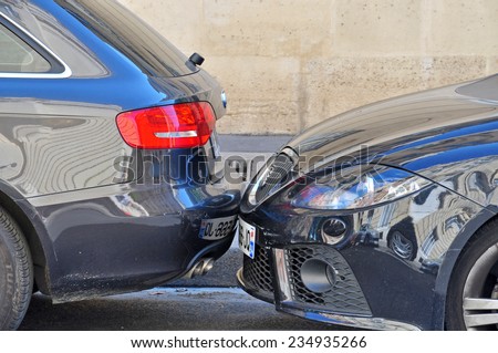 PARIS, FRANCE - MAY 7, 2011: Little road accident between two cars on the street of Paris on May 7, 2011.