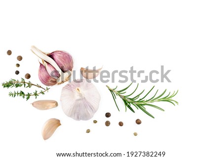 garlic with rosemary and peppercorn isolated on white background. Top view. Flat lay. High quality photo