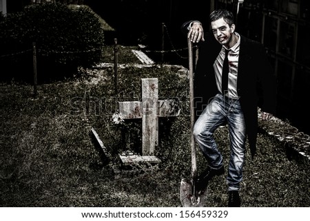 Vampire over a grave at the cemetery, Halloween Collection.