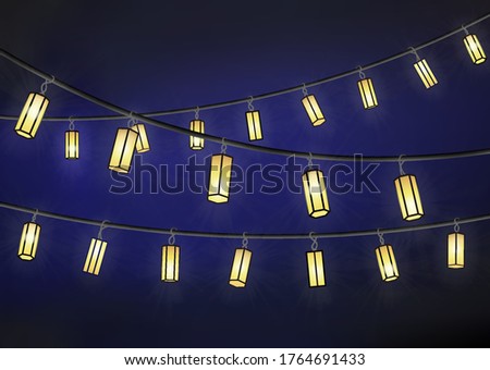 Lamps inside the lampshade garland. Three electric wires with beach lightbulbs  isolated on the dark blue background. Can be useful for christmas, birthday, ramadan, celebration event's images.