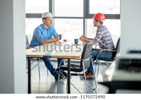 Similar – Image, Stock Photo Architect man having breakfast while working at computer in office