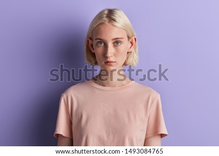 Similar – Image, Stock Photo Woman with big eye looking through a magnifying glass