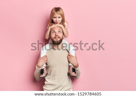 Similar – Image, Stock Photo Child kindly caresses his dog