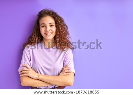 Similar – Image, Stock Photo Pretty young girl with blue hairstyle playing video exciting game on Tv with joystick on pink studio wall. Using modern technology.