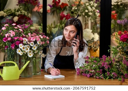 Similar – Image, Stock Photo Unrecognizable female professional florist making bouquets.