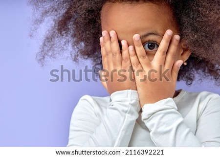 Similar – Image, Stock Photo Little girl covering face with big branch