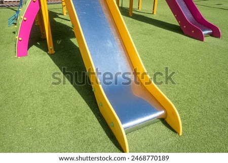 Similar – Image, Stock Photo metallic slide on the playgroundo on the street in Bilbao city Spain