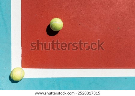 Similar – Foto Bild Zwei Bälle neben den Aufschlaglinien auf einem blauen Paddle-Tennisplatz.