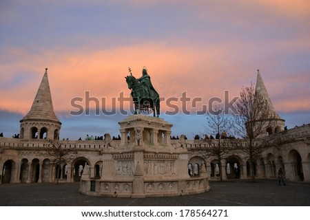 Fisherman\'s Bastion and the statue of Stephen I of Hungary by sunset