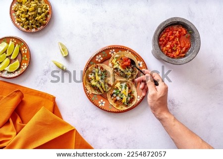 Similar – Image, Stock Photo Anonymous crop hands putting plates with raspberry and honey on table for breakfast