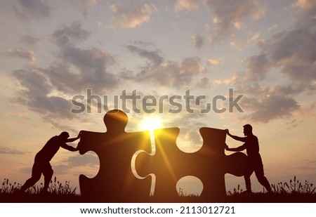 Vector black silhouette two men pushing to connect jigsaw puzzle with sunlight and bright sky. Creative symbol of business corporate teamwork to solutions, success and strategy concept illustration.