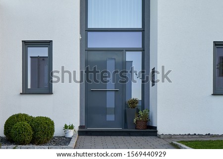 Similar – Image, Stock Photo Green door with ornamental windows