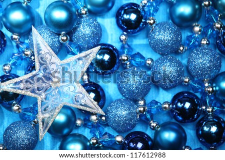Glitter star on blue balls