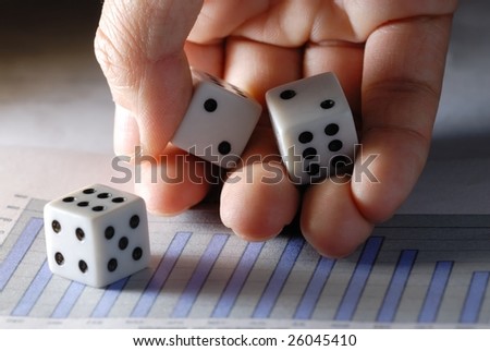 hand rolling dice onto graph