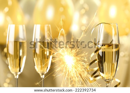 Glasses of champagne and fireworks,new year celebration.