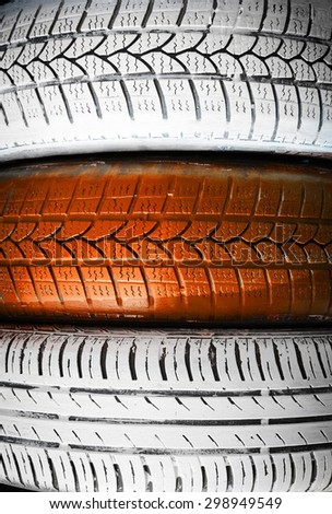 Old painted car tires close up