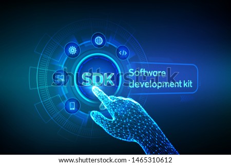 SDK. Software development kit programming language technology concept on virtual screen. Technology Concept. Robotic hand touching digital interface. Vector illustration.