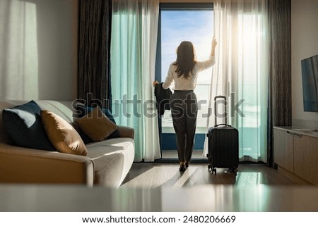 Similar – Image, Stock Photo Businesswoman looking at her colleague who is wearing funny glasses because he is going on vacation