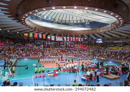 Bangkok, Thailand - July 3,2015 : Unidentified supporters on stand cheer and flag of the nation during  FIVB Volleyball World Prix Bangkok 2015 at Hua Mak Sport Complex.