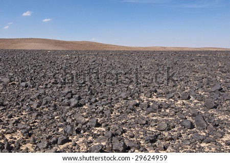 Black rocks in desert - Jordan, Middle East