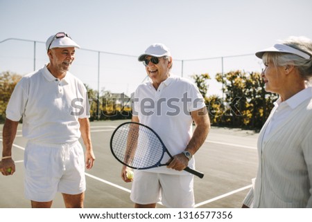 Similar – Image, Stock Photo Senior man playing tennis in gym