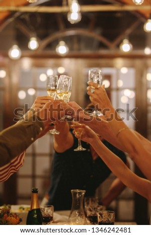 Similar – Image, Stock Photo Crop person having champagne poured into glass near pool