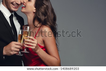 Similar – Image, Stock Photo Crop person having champagne poured into glass near pool
