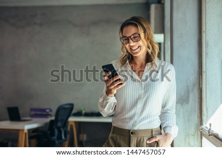 Similar – Image, Stock Photo Young smiling woman taking photo on vintage camera