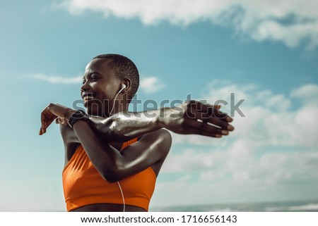 Similar – Foto Bild Sportlerin schaut auf eine flexible Freundin, die Übungen auf dem Luftseil ausführt