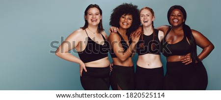 Similar – Image, Stock Photo Fit woman standing against sea during workout