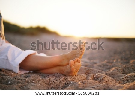 Similar – Image, Stock Photo Crop woman on sandy beach during vacation