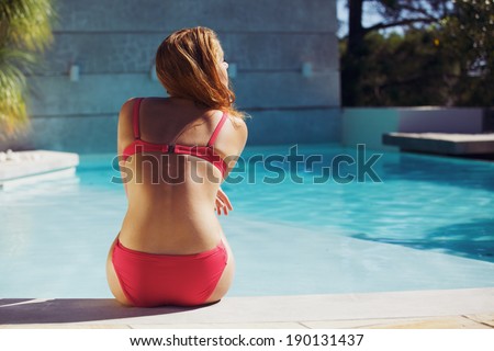 Similar – Image, Stock Photo Slim woman wearing swimming cap in pool