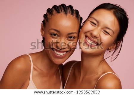 Similar – Image, Stock Photo Two beautiful multiethnic women making selfie and grimacing